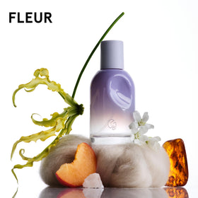 Glossier Mini Wardrobe Fragrance Set packaging with all four scents