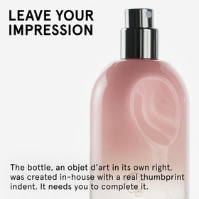 Glossier You Eau de Parfum spray application on wrist