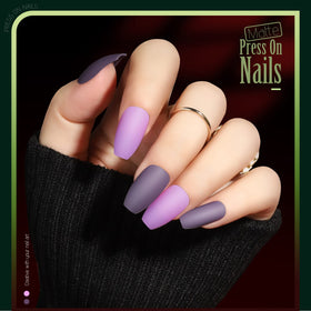Glossy coffin press on nails displayed in a transparent box