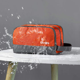 Gonex Travel Toiletry Bag open showing organized compartments