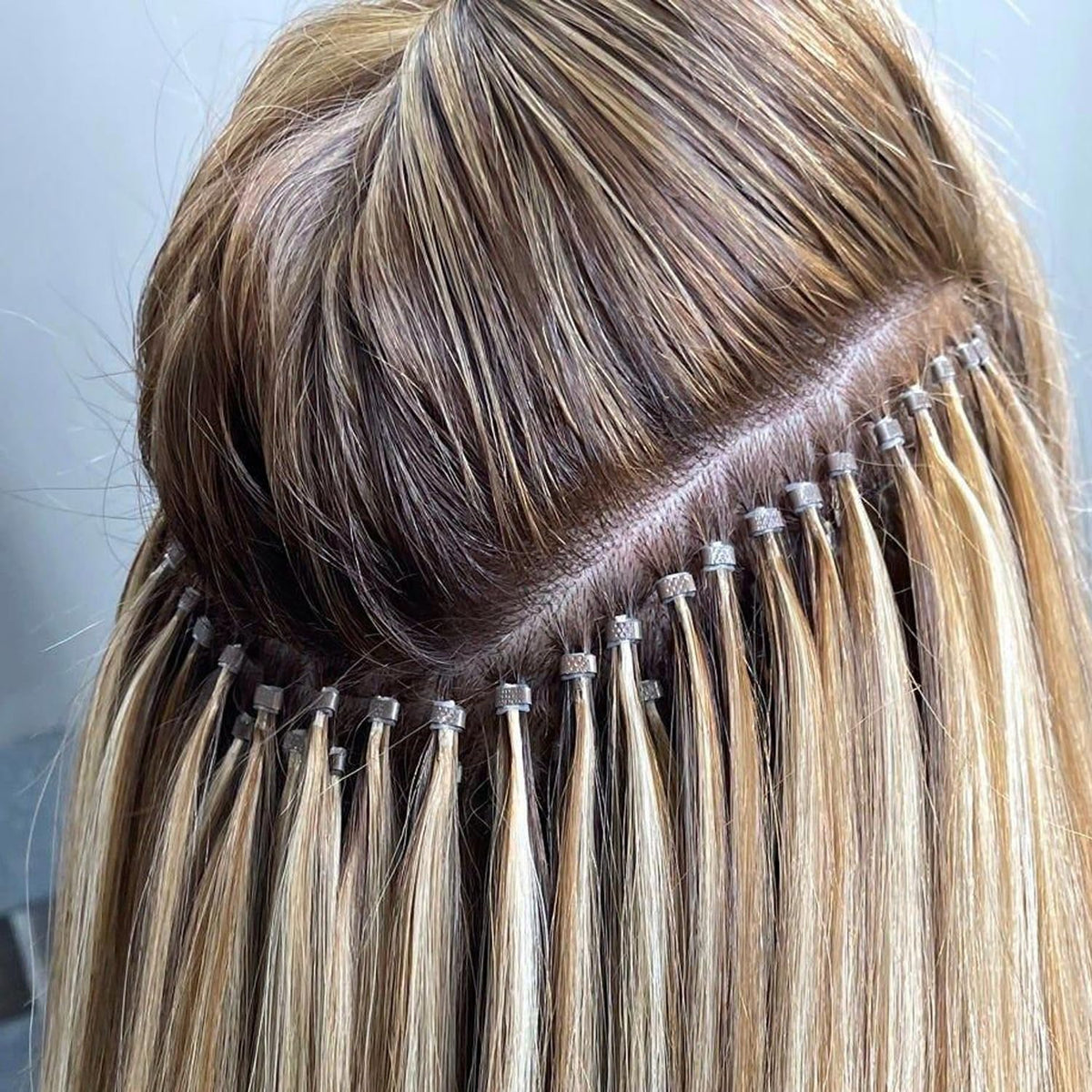 GOTDYA hair extension beads with extensions attached