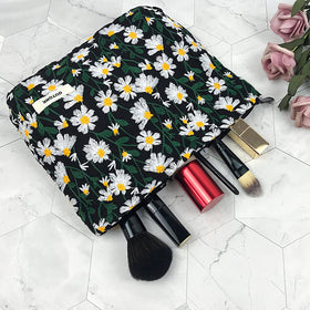 GUTGNK Corduroy Cosmetic Bag open with makeup items inside