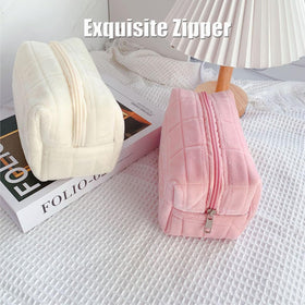 HABUAETY makeup bag open with cosmetics inside