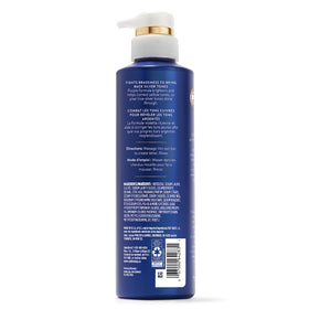 Hair Biology Biotin-Infused Purple Shampoo and Conditioner in use in the shower