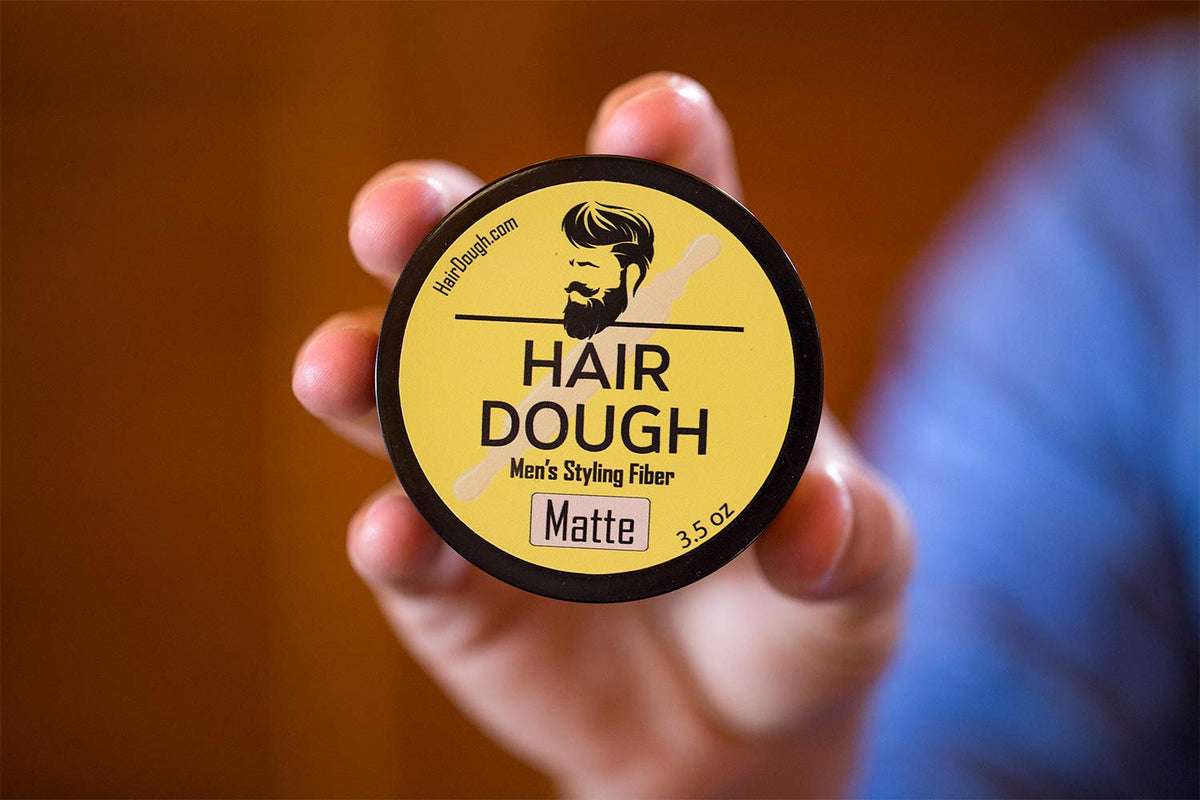 Hair Dough Styling Clay in a bathroom setting