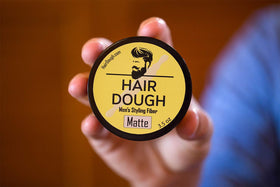Hair Dough Styling Clay in a bathroom setting
