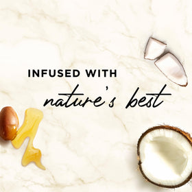 Hair Food Coconut & Argan Oil Heat Protectant Spray in a bathroom setting