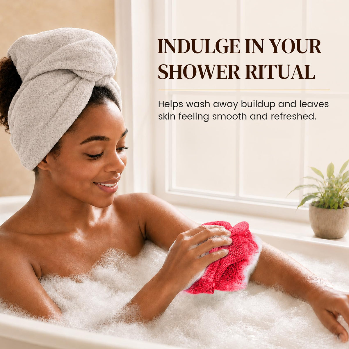 Hand holding FUTRICREAT African Net Sponge with body wash