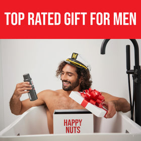 HAPPY NUTS Silicone Body Scrubber hanging in shower