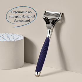 Harry's Winston razor handle showing ergonomic design and rubberized grip