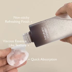 HARUHARU Black Rice Toner on a bathroom counter with skincare products