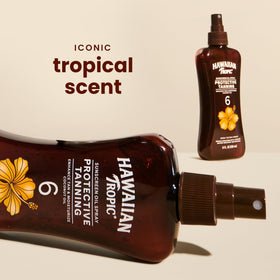 Hawaiian Tropic Dark Tanning Oil Spray side view with pump