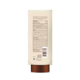 Hawaiian Tropic Sheer Touch SPF 70 Sunscreen Lotion packaging with sun backdrop