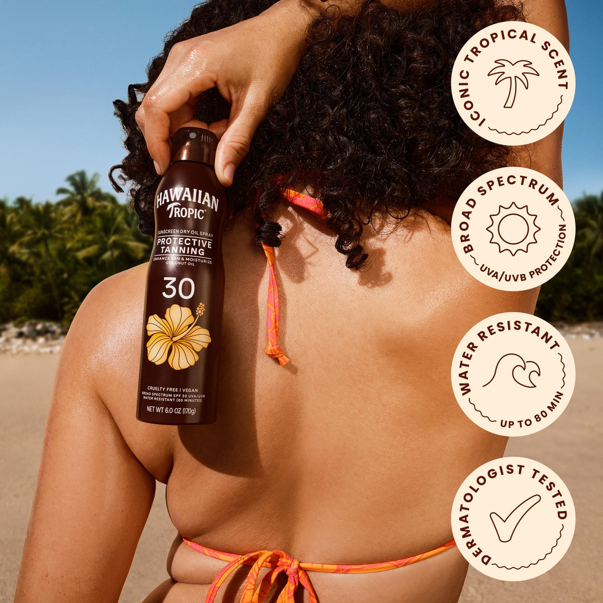 Hawaiian Tropic tanning lotion bottle with tropical scenery