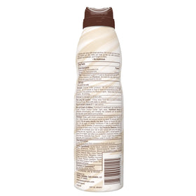 Hawaiian Tropic Weightless Hydration sunscreen spray in hand