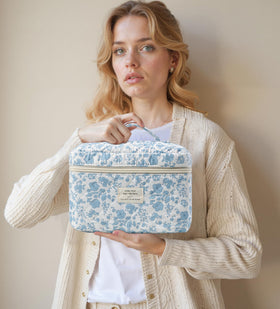 HBselect makeup bag set with floral pattern on a vanity