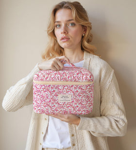HBselect Quilted Makeup Bag floral pattern on a vanity table