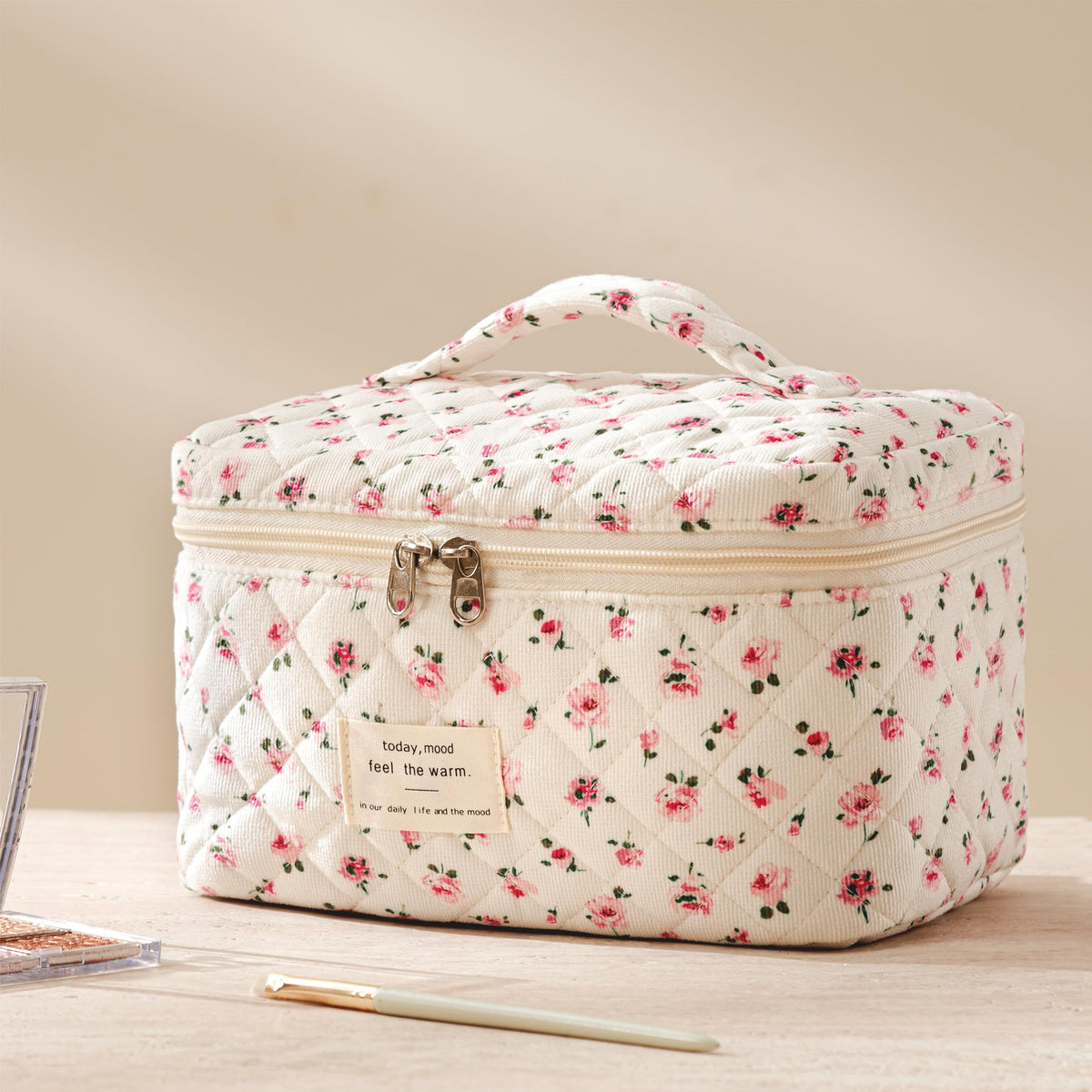 HBselect Quilted Makeup Bag Set folded in a suitcase