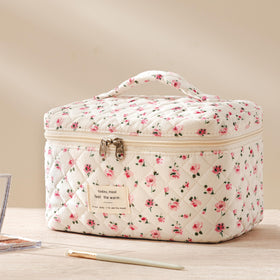 HBselect Quilted Makeup Bag Set folded in a suitcase