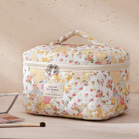 HBselect Quilted Makeup Bag set styled on a vanity