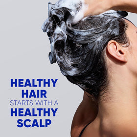 Head & Shoulders Classic Clean Anti-Dandruff Shampoo in bathroom setting