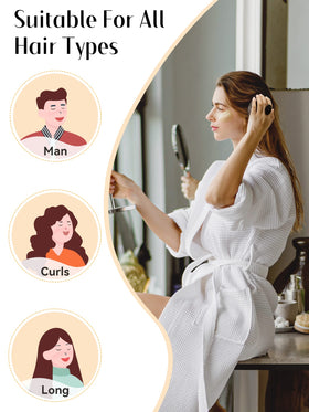 HEETA Hair Scalp Massager Brush with a person using it on long hair