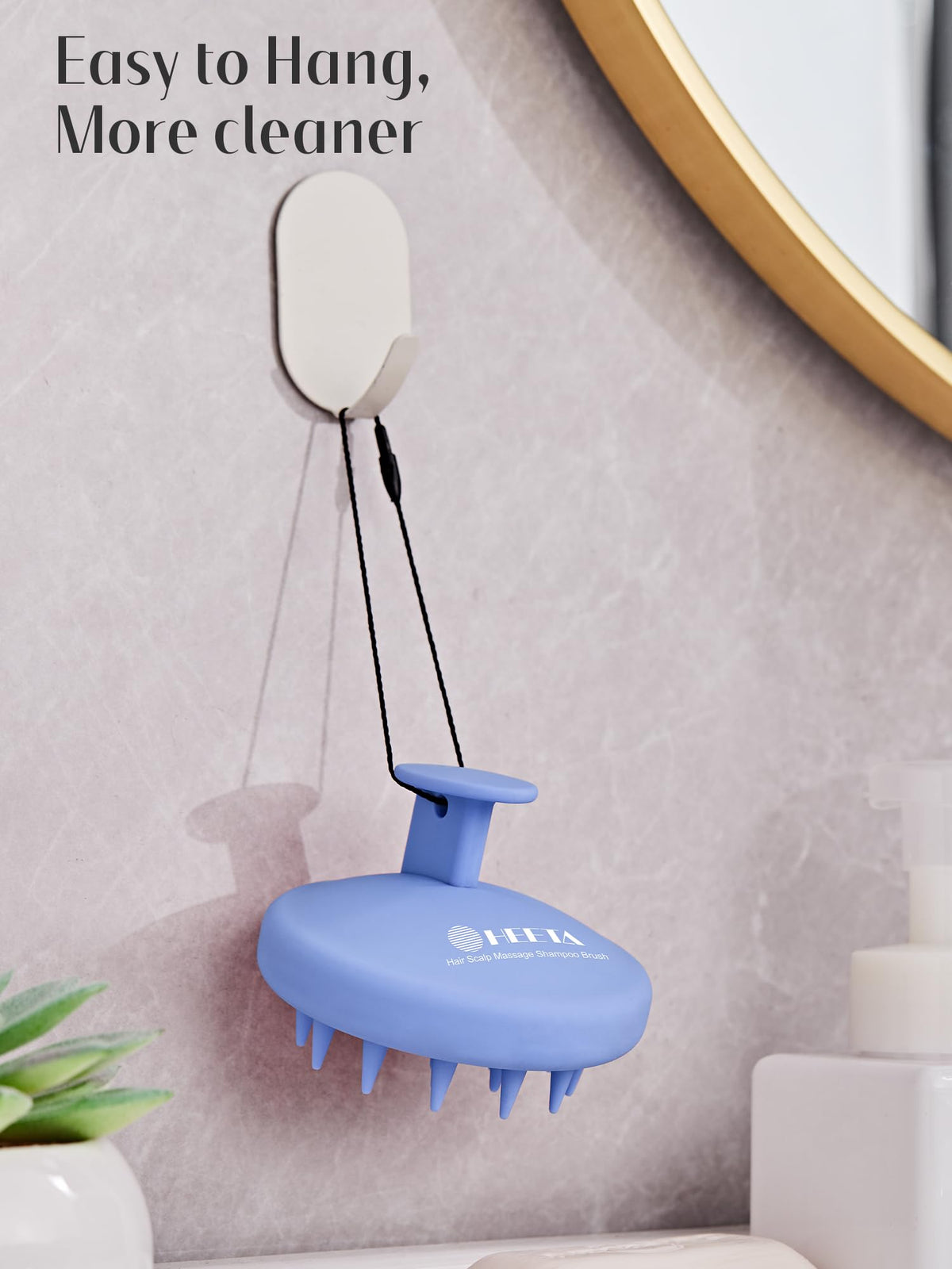 HEETA Silicone Scalp Massager in a relaxing bathroom setting