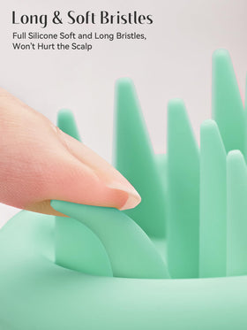 HEETA Silicone Scalp Massager showing ergonomic design