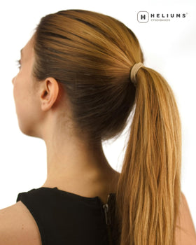 Heliums Thin Hair Ties in use on a ponytail
