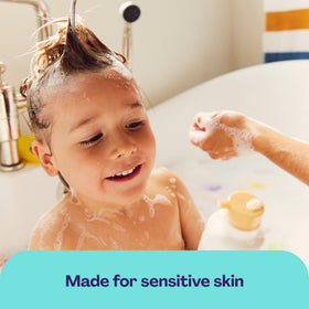 Hello Bello Baby Shampoo & Body Wash in a child's bath setting