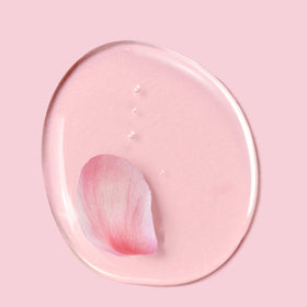 Herbal Essences Rose Hips Smooth Shampoo in bathroom setting
