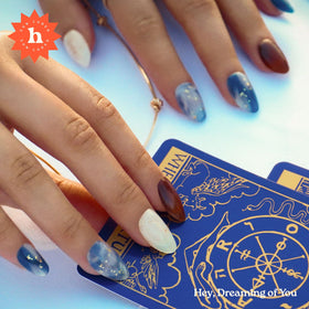 heyhae Semi Gel Nail Strips showing shimmering gold stars and deep blue design