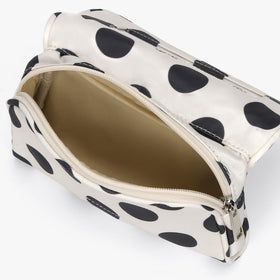 Hibilog makeup bag in a purse for easy carrying