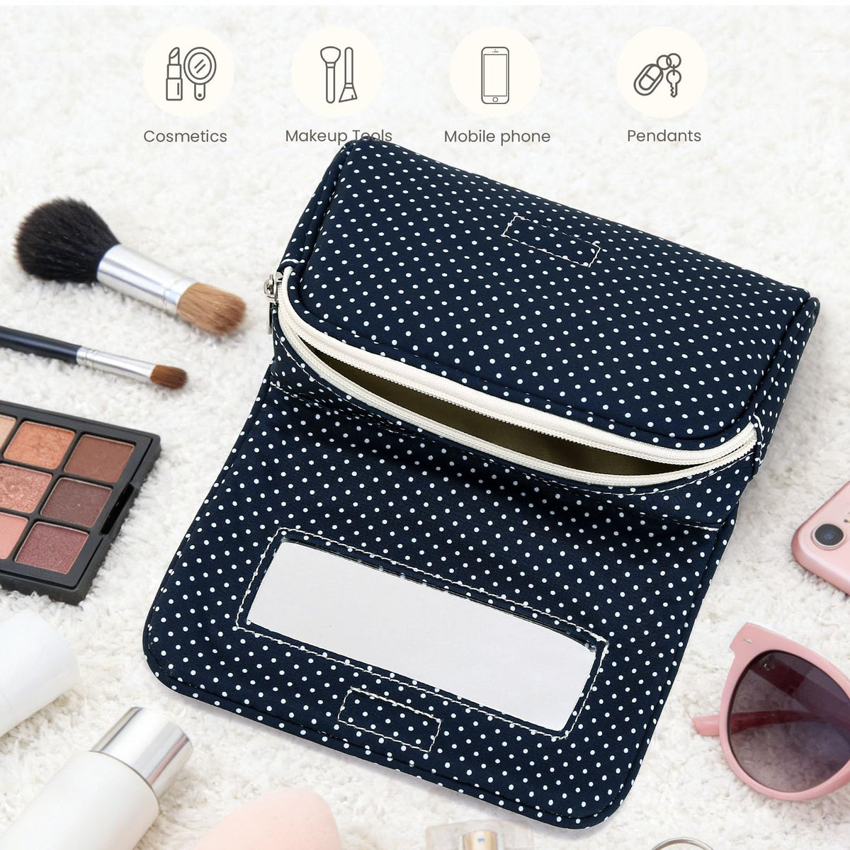 Hibilog makeup bag in lifestyle setting with accessories
