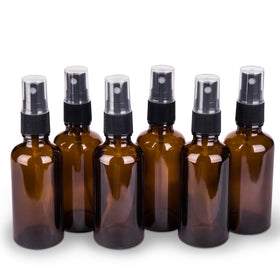 hmaimas 2oz amber glass spray bottle with black mist sprayer front view