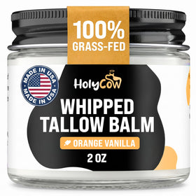 HolyCow Beef Tallow jar with lid off showing whipped texture