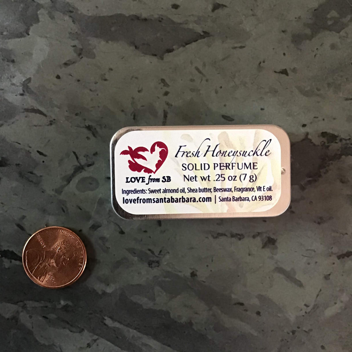 Honeysuckle Solid Perfume in a travel bag