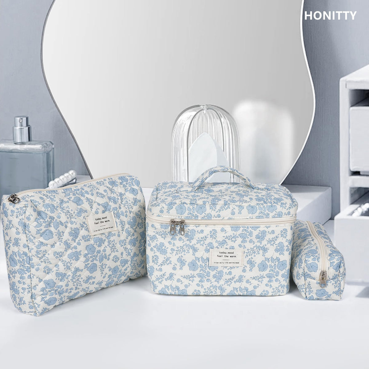 honitty Floral Makeup Bag Set packed in a suitcase
