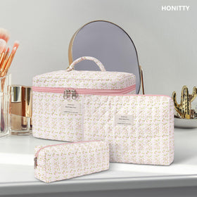 honitty floral pattern makeup bag on dresser