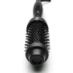 HOT TOOLS Pro Artist Black Gold Hot Styler in use styling hair