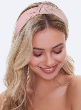 Huachi headbands displayed together on a flat surface
