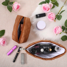 Huhumy makeup bags in a travel setting