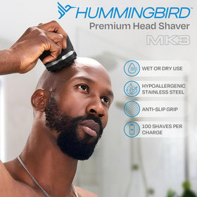 HUMMINGBIRD MK3 Head Shaver water-resistant design in use with shaving foam