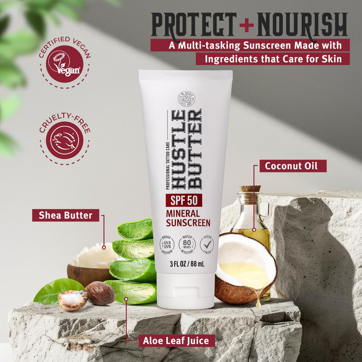 Hustle Butter Deluxe Tattoo Aftercare Sunscreen 3 oz on a beach towel