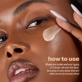 ICONIC LONDON Underglow Blurring Primer with makeup tools