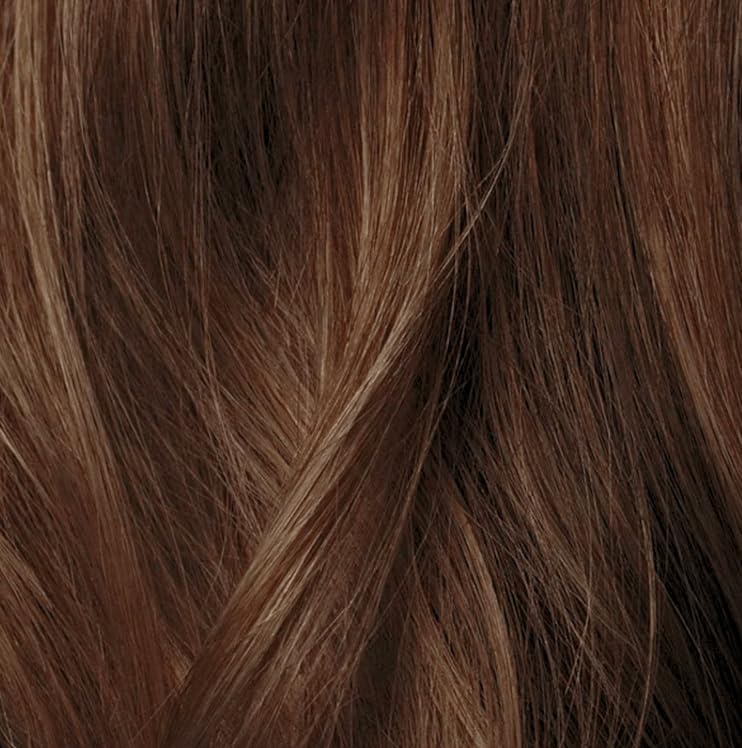 IGK Electric Bronze Hair Gloss being applied to hair
