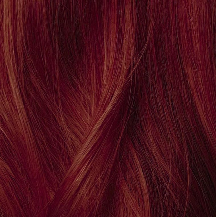 IGK On The Money Fiery Copper Hair Gloss on hair strands after application