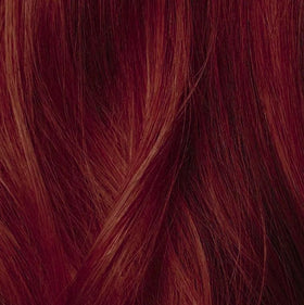 IGK On The Money Fiery Copper Hair Gloss on hair strands after application