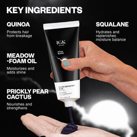 IGK Pitch Black Hair Gloss on a bathroom shelf