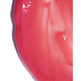 IGK Strawberry Milkshake Hair Gloss on bathroom counter